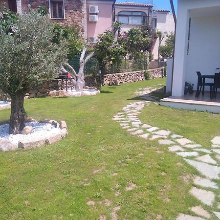 Villetta Cala D'Ambra ซาน เตโอโดโร ภายนอก รูปภาพ